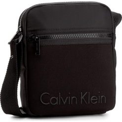 Saszetki i nerki męskie: Saszetka CALVIN KLEIN BLACK LABEL – Alec Reporter K50K503186 001