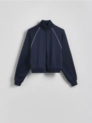 Rozpinana bluza ze stójką - granatowy. Niebieskie bluzy damskie Reserved, l, bez wzorów, z dzianiny, bez ramiączek, bez kaptura. W wyprzedaży za 69.99 zł.