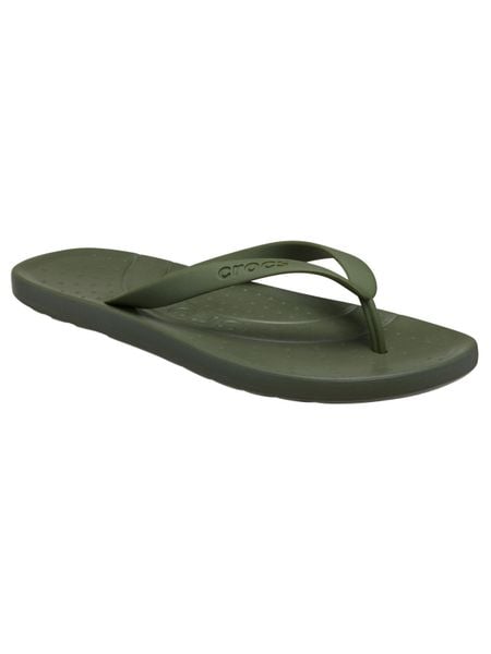 Kapcie Crocs Klapki Crocs Dorosłych. Zielone klapki damskie Crocs, bez wzorów, z materiału, bez zapięcia. Za 79.99 zł.