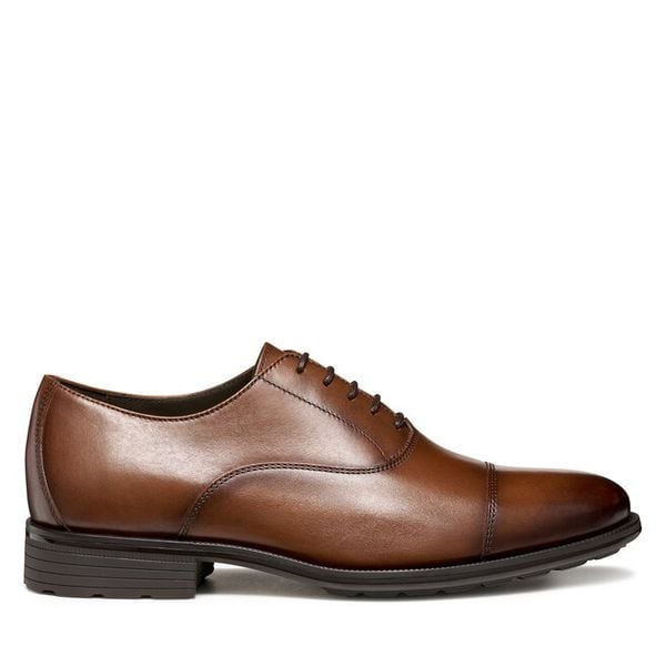 Półbuty Geox. Brązowe buty wizytowe męskie Geox, bez wzorów, bez obcasa, bez zapięcia. Za 409.99 zł.