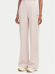 Guess Spodnie dresowe V6YB18 K4315 Różowy jasny Regular Fit. Czerwone spodnie dresowe damskie Guess, z aplikacjami, z dresówki. Za 394.99 zł.
