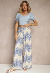 Niebieskie Spodnie z Wiskozy o Szerokim Kroju High Waist ze Wzorem Boho Neolissea. Niebieskie spodnie materiałowe damskie Renee, na lato, bez wzorów, z jeansu, boho, z podwyższonym stanem. Za 44.99 zł.