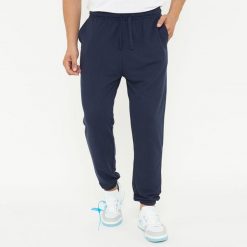 Spodnie sportowe unisex F BALLON niebieskie. Niebieskie buty sportowe męskie Legea, bez wzorów, z gumy, sportowe, na fitness i siłownię. W wyprzedaży za 92.00 zł.