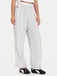 Puma Spodnie dresowe PUMA X ROSÉ T7 633796 32 Srebrny Relaxed Fit. Szare spodnie dresowe damskie Puma, bez wzorów, z dresówki. Za 479.99 zł.