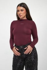 Bluzka damska DKNY. Bluzki damskie DKNY, s, bez wzorów, bez kołnierzyka, bez ramiączek. Za 299.00 zł.