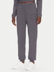 Calvin Klein Jeans Spodnie dresowe J20J225355 Szary Regular Fit. Szare spodnie dresowe damskie Calvin Klein Jeans, bez wzorów, z bawełny. Za 249.99 zł.