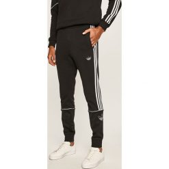Adidas Originals - Spodnie. Czarne spodnie sportowe męskie adidas Originals, l, bez wzorów, z bawełny. Za 269.90 zł.