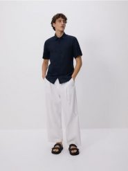 Lniana koszula slim fit - granatowy. Niebieskie koszule męskie Reserved, l, bez wzorów, z tkaniny, bez kołnierzyka, bez ramiączek. Za 159.99 zł.