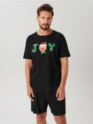 Piżama świecąca w ciemności - czarny. Czarne piżamy męskie Sinsay, l, bez wzorów, z bawełny, bez kołnierzyka, bez ramiączek. Za 39.99 zł.