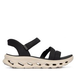 Sandały Skechers. Czarne sandały damskie Skechers, bez wzorów, bez obcasa, na płaskiej podeszwie, bez zapięcia. Za 379.99 zł.