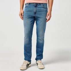 WRANGLER MĘSKIE SPODNIE JEANSOWE WRANGLER TEXAS SLIM BREEZE 112364458. Jeansy męskie Wrangler, z jeansu. Za 219.99 zł.