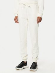 Armani Exchange Spodnie dresowe 8NYPLG YJE5Z 1130 Beżowy Regular Fit. Brązowe spodnie sportowe damskie Armani Exchange, bez wzorów, z bawełny. Za 269.99 zł.