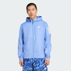 Kurtka Own The Run. Niebieskie kurtki męskie Adidas, m, bez wzorów, bez kaptura, do biegania. Za 329.00 zł.