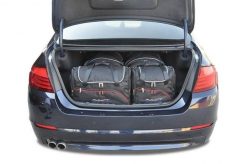 Torby Do Bagażnika Bmw 5 Limousine 2010-2016 4Szt Kjust. Czarne torby podróżne damskie KJUST, bez wzorów, z kauczuku. Za 1,249.00 zł.