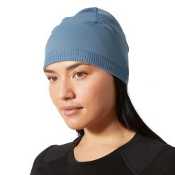 Czapka Helly Hansen Versalite. Niebieskie czapki damskie Helly Hansen, bez wzorów, z elastanu. Za 160.00 zł.