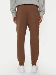 United Colors Of Benetton Spodnie dresowe 342ZUF01B Brązowy Regular Fit. Brązowe spodnie sportowe męskie United Colors Of Benetton, m, bez wzorów, z bawełny. Za 129.99 zł.