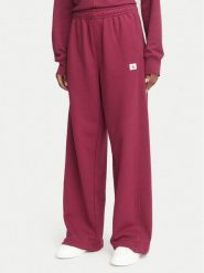 Calvin Klein Jeans Spodnie dresowe LV047C249G Czerwony ciemny Wide Leg. Czerwone spodnie dresowe damskie Calvin Klein Jeans, bez wzorów, z bawełny. Za 369.99 zł.