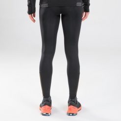Legginsy do biegania w terenie damskie Kiprun Run 900. Czarne legginsy damskie EVADICT, bez wzorów, ze skóry. Za 119.99 zł.
