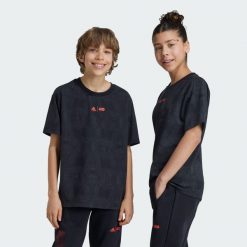 Puma Koszulka Evostripe 67919501. Czarne bluzki damskie Puma, bez wzorów, sportowe, bez kołnierzyka, bez ramiączek. Za 70.99 zł.