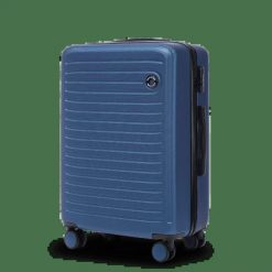 Walizka ŚREDNIA Wings ABS+ COOT 24" Middle Blue. Niebieskie walizki damskie Wings, bez wzorów, z materiału, średnie. Za 149.90 zł.