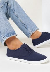 Granatowe Tenisówki z Krótkim Sznurowaniem Madilinne. Niebieskie trampki i tenisówki damskie Born2be, bez wzorów, z jeansu, bez zapięcia. Za 34.99 zł.