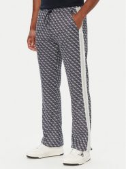 Guess Spodnie dresowe Z5BB07 K2042 Granatowy Regular Fit. Niebieskie spodnie sportowe męskie Guess, m, z aplikacjami, z dresówki. Za 524.99 zł.