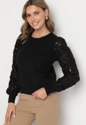 Czarny Sweter z Wiskozą z Ozdobnymi Koronkowymi Rękawami z Cekinami Tiliala. Czarne swetry nierozpinane damskie Born2be, bez wzorów, z jeansu, eleganckie, bez kołnierzyka, bez ramiączek. Za 64.99 zł.