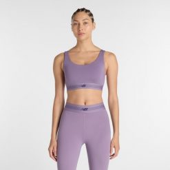 Biustonosz do treningu New Balance AC WB61Q0QKAA5 – fioletowy. Fioletowe bielizna sportowa damska New Balance, l, bez wzorów, z materiału. Za 219.99 zł.