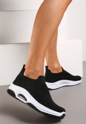 Czarne Wsuwane Buty Sportowe na Koturnie z Perforacją Mellarina. Czarne obuwie sportowe damskie Born2be, bez wzorów, bez zapięcia. Za 49.99 zł.