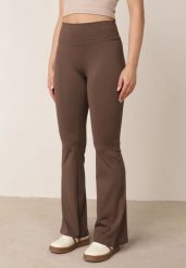 Brązowe Legginsy o Kroju Dzwonów z Wysokim Stanem i Modelującym Marszczeniem Pronone. Brązowe legginsy damskie Born2be, bez wzorów, z jeansu. Za 69.99 zł.