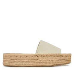 Klapki Calvin Klein. Niebieskie klapki damskie Calvin Klein, bez wzorów, bez obcasa, bez zapięcia. Za 409.99 zł.