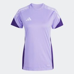 Koszulka piłkarska damska ADIDAS Tiro 25 Competition treningowa. Bluzki damskie Adidas, l, bez wzorów, sportowe, bez kołnierzyka, bez ramiączek. Za 159.99 zł.