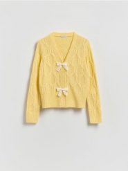 Kardigan z kokardkami - żółty. Żółte kardigany damskie Reserved, l, bez wzorów, z dzianiny, bez kołnierzyka. Za 129.99 zł.