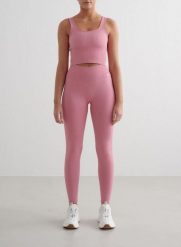Damskie legginsy bezszwowe, prążkowane, wysoki stan, squat proof różowe. Czerwone legginsy damskie Aim'n, bez wzorów, z dzianiny. Za 254.00 zł.