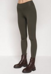 Ciemnozielone Klasyczne Legginsy z Regularnym Stanem Ralindia. Zielone legginsy damskie Born2be, bez wzorów, z jeansu. Za 39.99 zł.