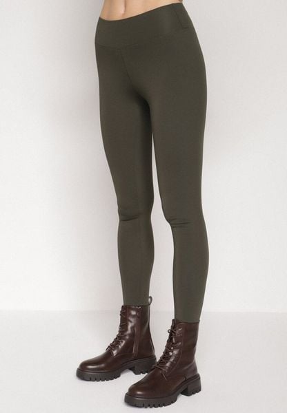 Ciemnozielone Klasyczne Legginsy z Regularnym Stanem Ralindia. Zielone legginsy damskie Born2be, bez wzorów, z jeansu. Za 29.99 zł.