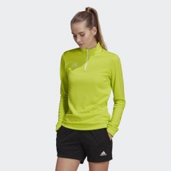Bluza piłkarska damska Adidas Entrada 22 Training Top. Żółte bluzy damskie Adidas, xs, bez wzorów, sportowe, bez ramiączek, bez kaptura. Za 100.99 zł.