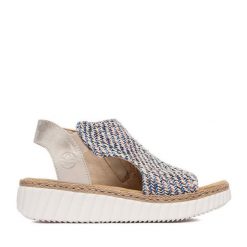 Sandały Rieker. Niebieskie sandały damskie Rieker, bez wzorów, bez obcasa, na koturnie, bez zapięcia. Za 329.99 zł.