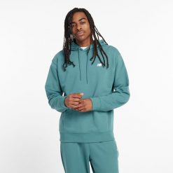 Bluza męska New Balance MT41508NUS – niebieska. Niebieskie bluzy męskie New Balance, m, z aplikacjami, z bawełny, bez kaptura. Za 169.99 zł.