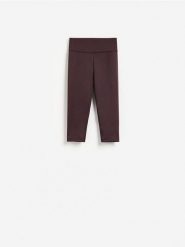 Legginsy capri - ciemnofioletowy. Fioletowe legginsy damskie Reserved, bez wzorów, z dzianiny. Za 69.99 zł.