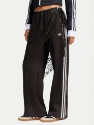 Adidas Spodnie dresowe 2In1 Firebird Loose Track Trousers With Lace Skirt LG4275 Brązowy Relaxed Fit. Brązowe spodnie dresowe damskie Adidas, bez wzorów, z bawełny. Za 369.99 zł.