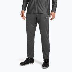 Spodnie piłkarskie męskie Under Armour Challenger Pique. Szare spodnie sportowe męskie Under Armour, m, bez wzorów, z dresówki, do piłki nożnej. Za 149.99 zł.