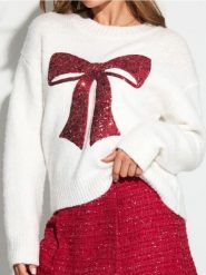 Sweter z cekinową aplikacją w kształcie kokardy i domieszką wełny - kremowy. Białe swetry nierozpinane damskie Sinsay, l, z aplikacjami, z wełny, bez kołnierzyka, bez ramiączek. Za 69.99 zł.