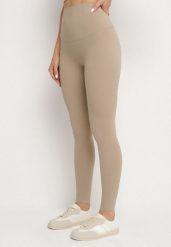 Beżowe Klasyczne Legginsy z Wysokim Stanem Melio. Brązowe legginsy damskie Born2be, bez wzorów, z jeansu. Za 44.99 zł.