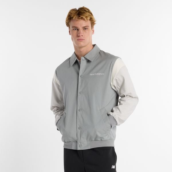 Kurtka męska New Balance MO51507YST – szara. Szare kurtki męskie New Balance, m, bez wzorów, z bawełny, klasyczne, bez kaptura. Za 399.99 zł.