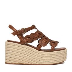 Sandały Badura. Brązowe sandały damskie Badura, bez wzorów, bez obcasa, bez zapięcia. Za 379.99 zł.