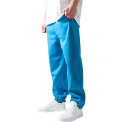 Spodnie Urban Classics basic. Fioletowe spodnie materiałowe męskie Urban Classics, bez wzorów. Za 198.50 zł.