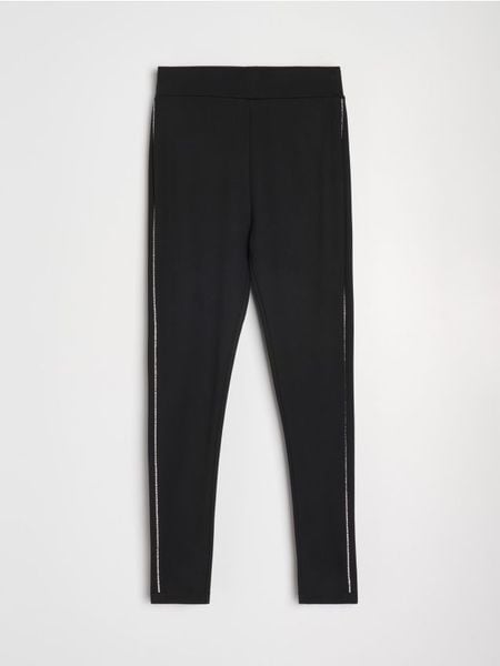 Legginsy z kryształkowym lampasem - czarny. Czarne legginsy damskie Sinsay, bez wzorów. Za 49.99 zł.
