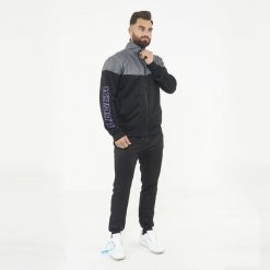 Dres sportowy kompletny UCLA męski. Czarne komplety dresowe męskie Legea, l, bez wzorów, z dresówki. W wyprzedaży za 147.50 zł.