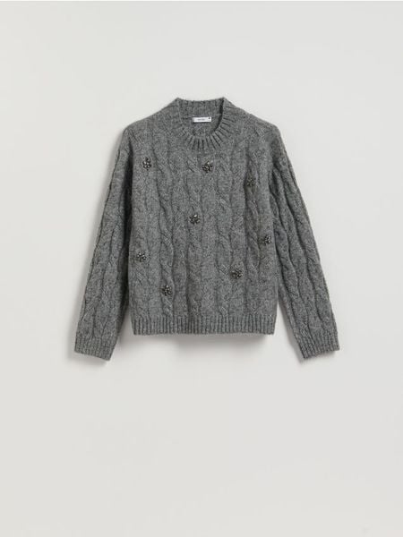 Sweter z błyszczącą aplikacją - szary. Szare swetry nierozpinane damskie Reserved, l, z aplikacjami, z dzianiny, bez kołnierzyka, bez ramiączek. Za 159.99 zł.